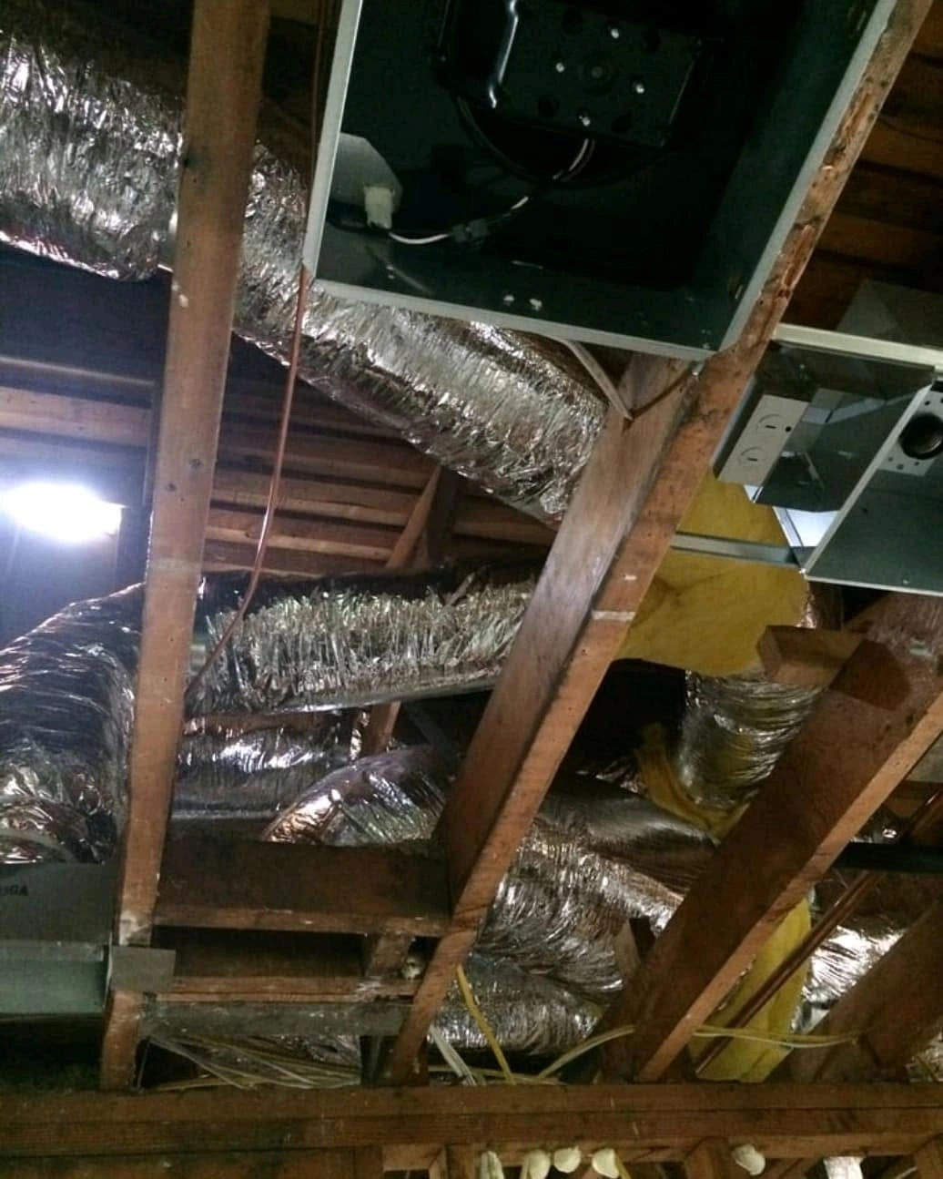 Insulated residential attic air ductwork installation and custom airflow sealing